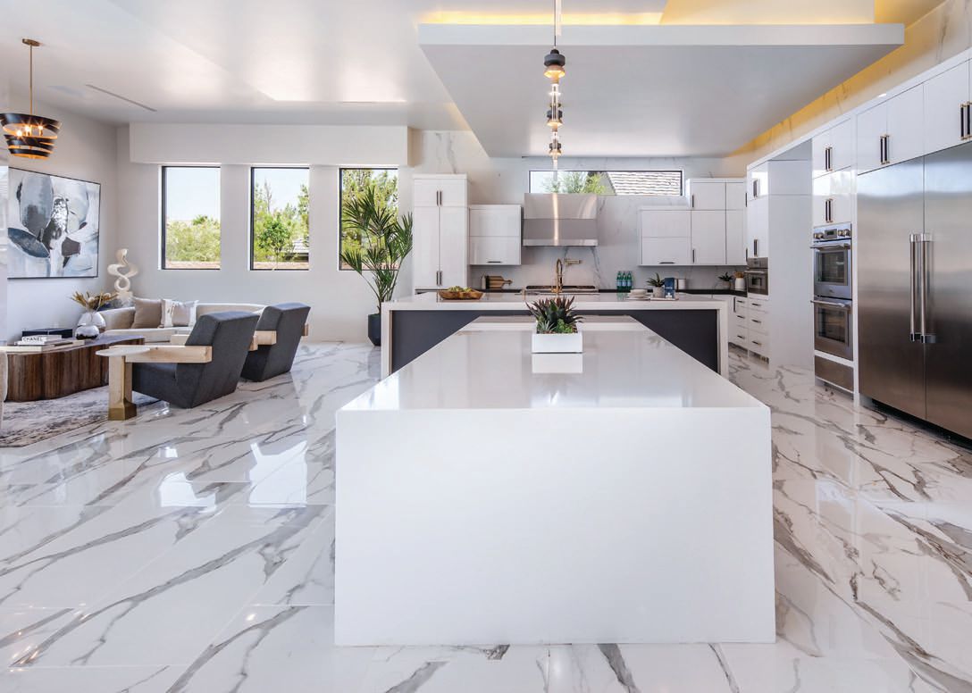 Marble floors run through the gourmet kitchen. PHOTO COURTESY OF THE IVAN SHER GROUP
