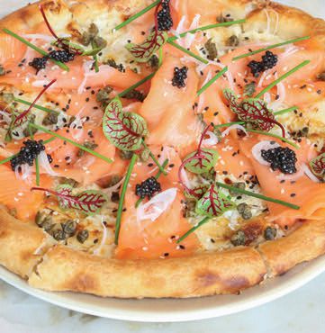 The salmon and caviar pizzetta at Wally’s Wine & Spirits PHOTO COURTESY OF: CAESARS ENTERTAINMENT