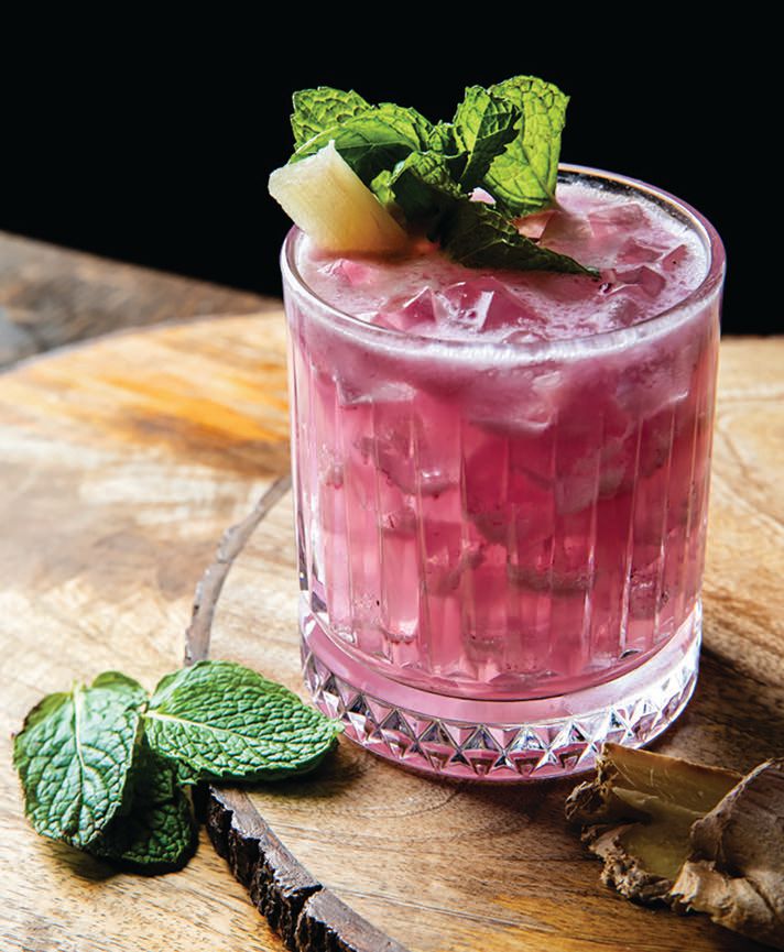 TAO’s Essence cocktail includes Diplomatico Planas rum, Domaine de Canton ginger liqueur, wild blueberry, coconut, cold-pressed lime and essential mint oil PHOTO COURTESY OF TAO GROUP