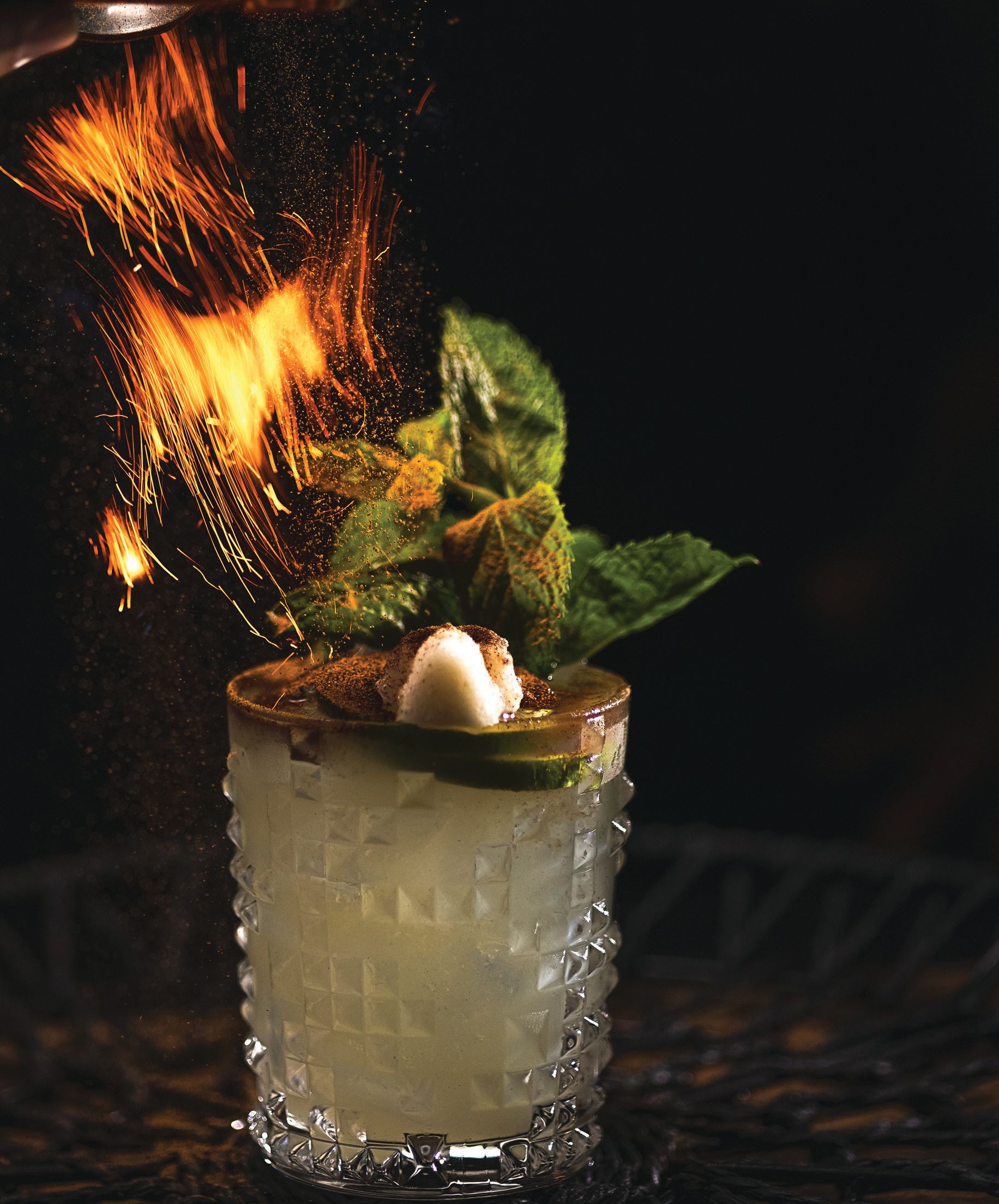 The flaming Ghost Rider margarita includes Olmeca Altos Plata tequila, fresh mint, lime and agave. FOOD AND DRINK PHOTO BY TJ PEREZ