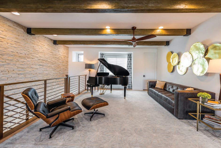 An Eames chair off sets the stunning Steinway & Sons Teague Sketch 1111 piano PHOTO BY GRACIE HENLEY/PREMIER PROPERTY TOURS