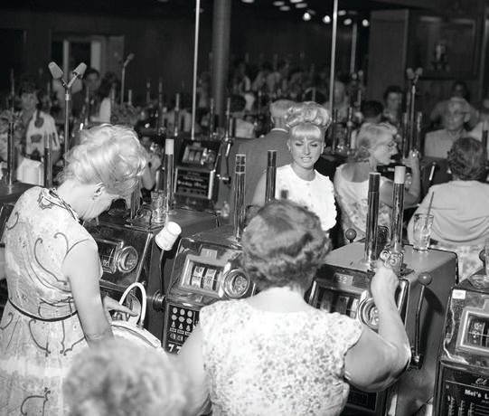 Ladies play slot machines at the El Cortez casino in 1966. PHOTO BY LAS VEGAS NEWS BUREAU